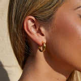 OW Small Love Earrings – Earrings by Olluwa, 18k gold-plated stainless steel, styled on ear