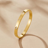 OW Olensya Bracelet – Bracelet by Olluwa, 18k gold-plated stainless steel, product flat lay