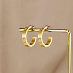 OW Small Love Earrings – Earrings by Olluwa, 18k gold-plated stainless steel, close-up detail