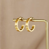 OW Small Love Earrings – Earrings by Olluwa, 18k gold-plated stainless steel, close-up detail
